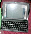 OLPC XO next to a Psion Netbook 2