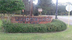 Welcome Sign at the entrance to Woodbranch Village