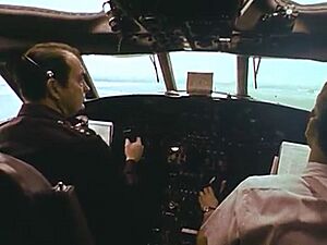 Chairman of The Joint Chiefs of Staff General David C. Jones Piloting a Lockheed VC-140B JetStar