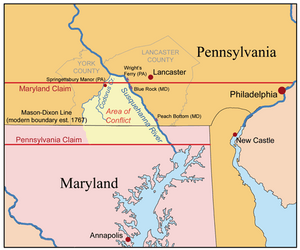 The Maryland-Pennsylvania boundary dispute: The conflict occurred in the Conejohela Valley with the northern apex just north of the mid-river Coejohela Flats islands, south of Wrightsville, Pennsylvania. These were inundated after the Safe Harbor Dam flooded the upper Coejoheala under Lake Clarke.