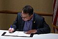 Eastern Band of Cherokee Indians Vice Chief Richie Sneed signing the agreement (cropped)