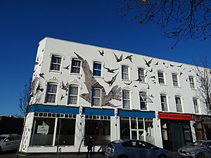 Mateusz Odrobny's 'The Birds' mural at 527 to 534 High Road Leytonstone