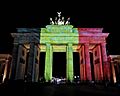 Brandenburg Gate lit up in Belgian flag colors to show solidarity