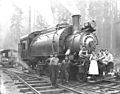 Crew and waitresses with Wynooche Timber Company's two-truck Baldwin saddle-tank 2-6-2T locomotive no 3, Montesano, ca 1921 (KINSEY 968)