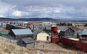 View of Fairplay and South Park looking south from State Highway 9. The historic buildings of South Park City, an open-air museum, are in the foreground.