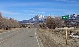 Maher in 2016, with Mount Lamborn in the distance.