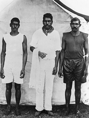 Three Aboriginal Australian men posing outside a tent, Durundur reserve, circa 1902