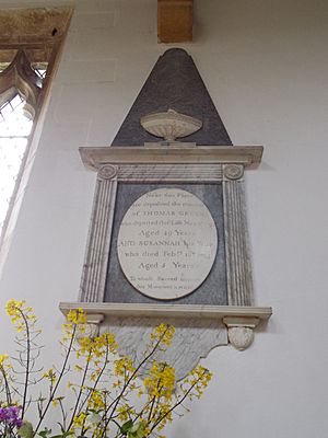 34 Aslackby St James, interior - South Aisle plaque 02