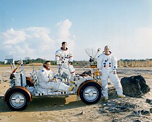 Apollo 16 crew with LRV trainer (KSC-72PC-133)