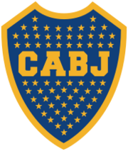 A Blue shield with a golden border. Inside the shield, 67 stars inside the shield with the golden letters "CABJ" (meaning "Club Atlético Boca Juniors") printed around the center, separating the stars