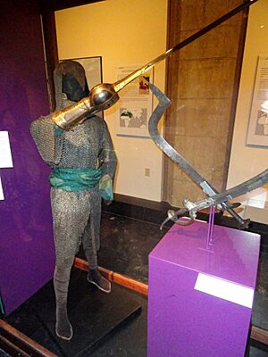 Mughal armor, India-Pakistan, mail head defense Lahore 1800s, mail shirt perhaps 1700s, pata gauntlet-sword India 1600s-1700s - Higgins Armory Museum - DSC05543