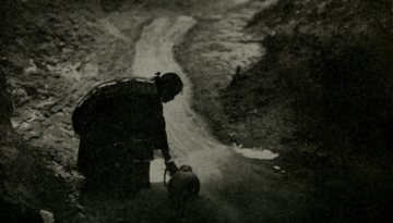 Navajo Woman at waterfall ca 1920