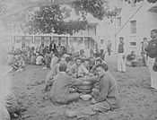 Oahu Prison inmates eating poi (PP-61-5-016)