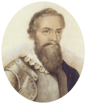 Half-length monochrome portrait of a bearded man with a lace collar over armor
