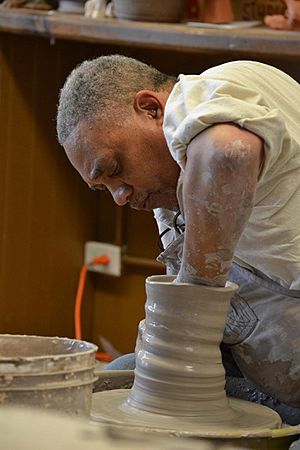 Potter Jim McDowell throwing at the wheel