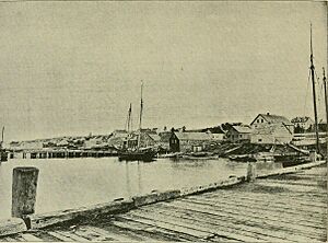 With fly-rod and camera (1890) (14802686563)