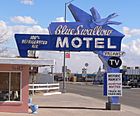 Blue Swallow Motel sign from W 1