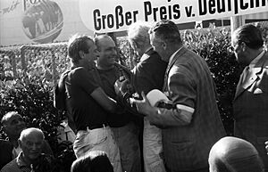 Collins Fangio and Hawthorn celebrate Nurburgring 1957