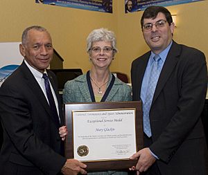 Mary Glackin receives NASA medal.jpg