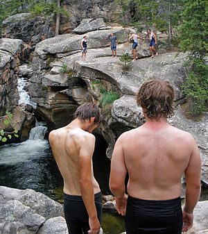 Swimmers at Devil's Punchbowl near Independence Pass, CO