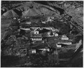Taos County, New Mexico. View of Valdez. Note layout of houses in square around the church, a styl . . . - NARA - 521935