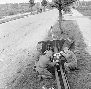 A 6-pdr anti-tank gun set up to protect a road in Nijmegen, Holland, 17 October 1944. B11053