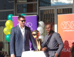 Aron Baynes and Patty Mills in front of the ACT Legislative Assembly in July 2014