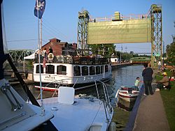 The Emita II passes through Lock 24 across from Paper Mill Island in downtown Baldwinsville.