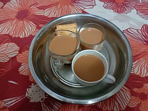 Cups full of milk tea, in West Bengal, India