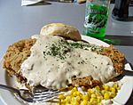 Chicken fried steak topped with gravy
