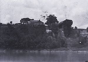 Prairie Bluff, taken from the Alabama River in 1894.  Some buildings and the cotton slide were still present at this time.