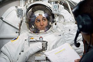 Astronaut Nicole Stott participates in an Extravehicular Mobility Unit spacesuit fit check