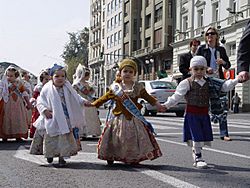 Children parading in historical Valencian costumes