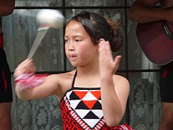 Maori girl in traditional dress