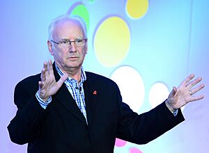 Pete Waterman speaking at the 2014 TGTG Conference 2014 3 (cropped)