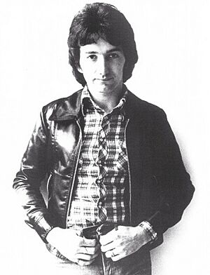 Queen News Of The World (1977 Press Kit Photo 07) John Deacon.jpg