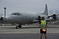 AP-3C Orion and a RAAF airman at Kadena Air Force Base in October 2018