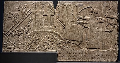 Assyrian Relief Attack on Enemy Town from Kalhu (Nimrud) Central Palace reign of Tiglath-pileser III British Museum - 2
