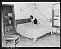 Bedroom home of Alvis New, miner who lives in company housing project. Adams, Rowe & Norman Inc., Porter Mine... - NARA - 540593