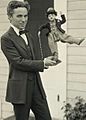 Charlie Chaplin with doll