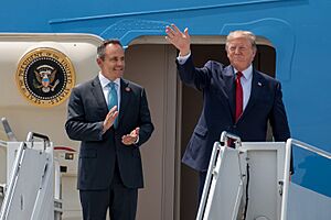 Donald Trump and Matt Bevin greet supporters as they arrive at the Kentucky Air National Guard Base in Louisville