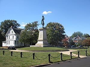 Hugh Mercer Statue With Houses in Background 1300 Block Washington Avenue Historic District Frederickburg VA