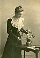 Margaret Sybella Brown with flowers and books
