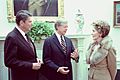 President Jimmy Carter welcomes President-elect Ronal Reagan and Nancy Reagan to the White House for a tour
