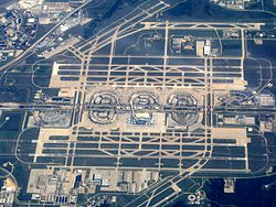 An aerial photograph of DFW Airport, including its runways