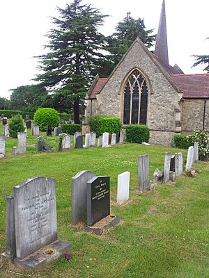 Fulton Mackay's grave and the cemetery's chapel.jpg