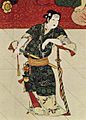 Okuni with cross dressed as a samurai