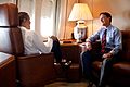 President Barack Obama talks with Sen. Evan Bayh (D-Ind.) aboard Air Force One during the flight to Wakarusa, Ind. for a speech at Monaco RV manufacturing, on Aug. 5, 2009