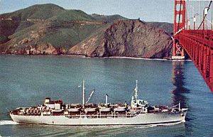 USNS General C.G. Morton (T-AP-138) passing under the Golden Gate Bridge, San Francisco, California (USA), in the 1950s