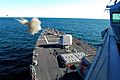 US Navy 070111-N-4515N-509 Guided missile destroyer USS Forest Sherman (DDG 98) test fires its five-inch gun on the bow of the ship during training